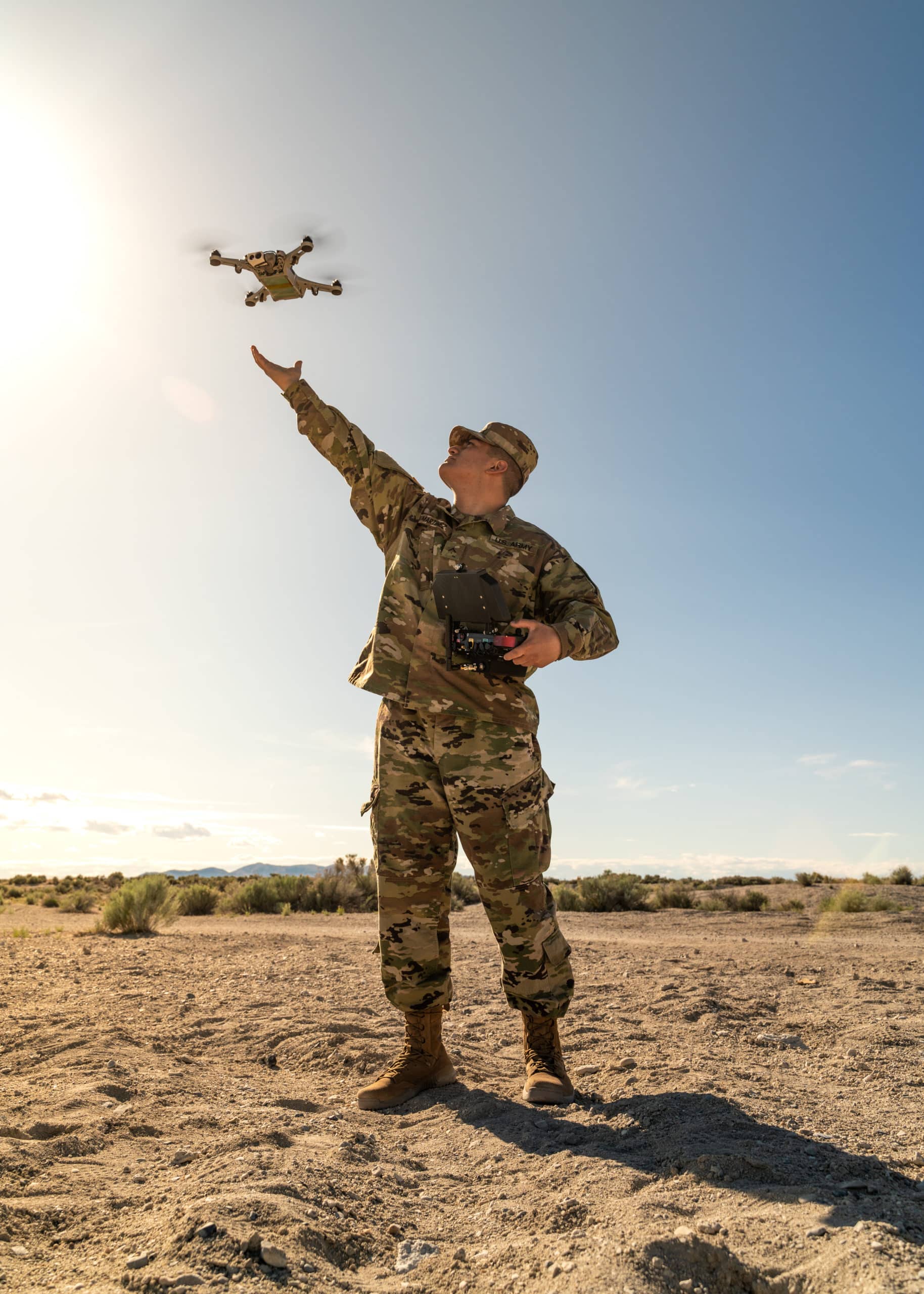 Soldier hand launching Eagle Drone